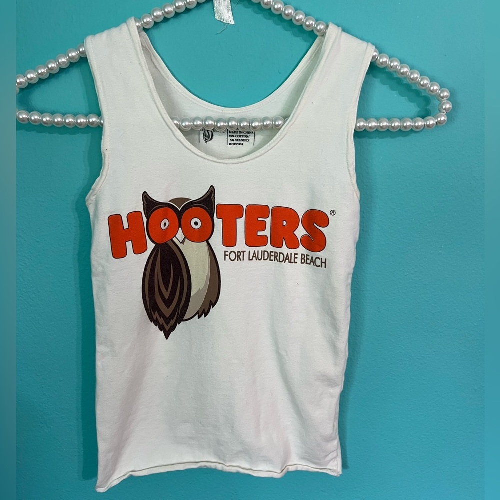 #901 EUC Hooters Tank Top with “Hooters makes you happy!” On The Back